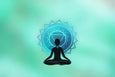 A silhouetted figure meditating in lotus position, surrounded by a blue chakra symbol, against a soft green background.