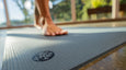 a person standing on the manduka pro yoga mat barefoot