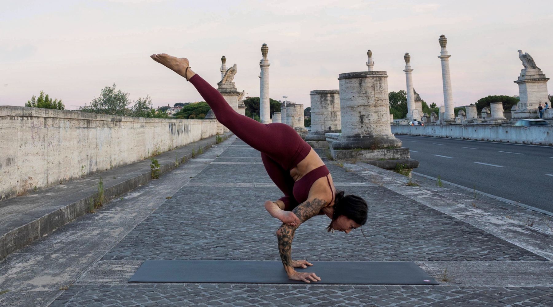 Yoga Teacher Clotilde in Rocket Yoga Inversion