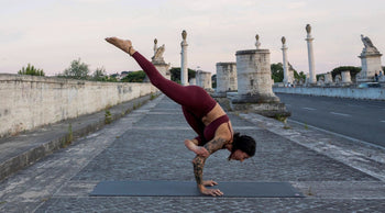 Yoga Teacher Clotilde in Rocket Yoga Inversion